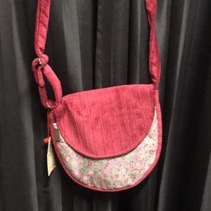 Designer bag color is more like maroon